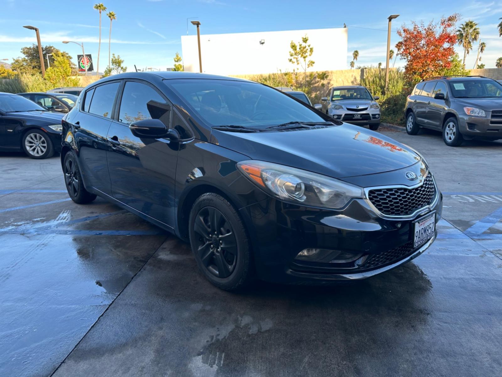 2016 Black /Black Kia Forte 5-Door Cloth (KNAFK5A87G5) with an 4 CYLINDER engine, Automatic transmission, located at 30 S. Berkeley Avenue, Pasadena, CA, 91107, (626) 248-7567, 34.145447, -118.109398 - Photo #6